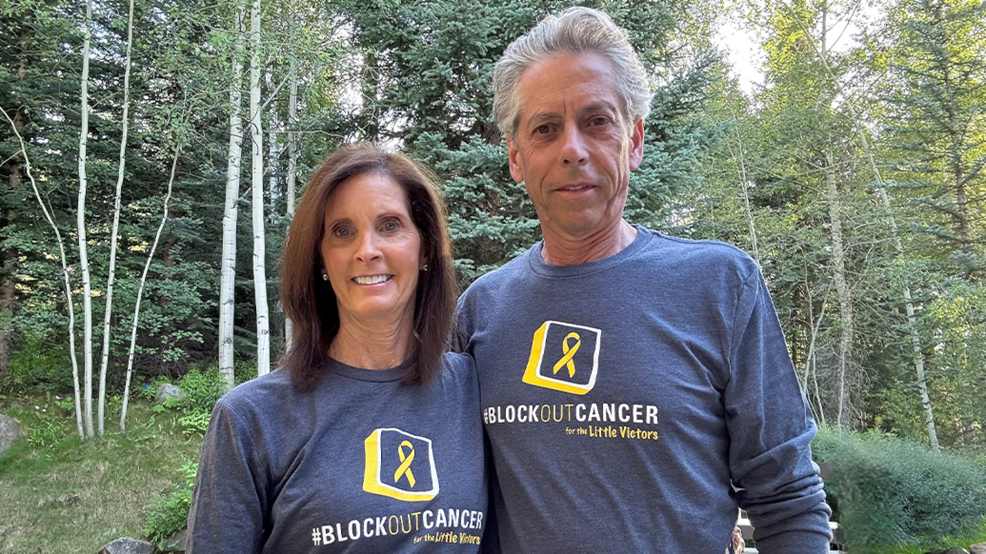 Donors Linda and Andy Jacob proudly wearing their Block Out Cancer t-shirts.